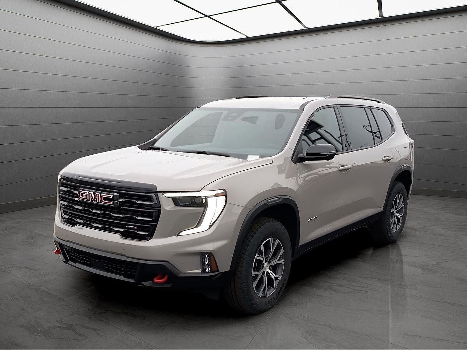 2026 GMC Acadia AT4 in Riverstone Metallic — front three-quarter view
