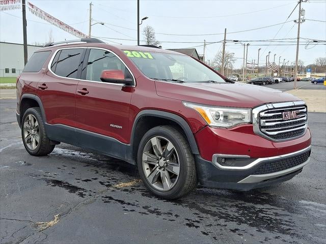 2017 GMC Acadia SLT in Crimson Red Tintcoat — front three-quarter view