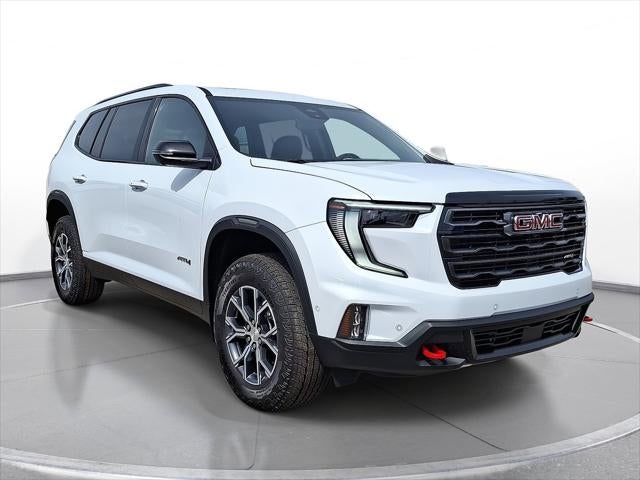 2026 GMC Acadia AT4 in Glacier White Tricoat — front three-quarter view