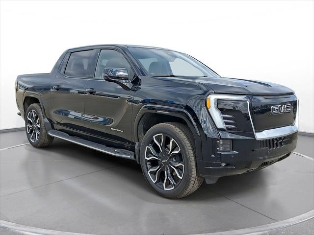 2025 GMC Sierra EV Max Range Denali in Onyx Black — front three-quarter view
