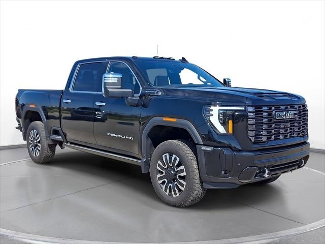 2025 GMC Sierra 3500 HD Denali Ultimate in Onyx Black — front three-quarter view