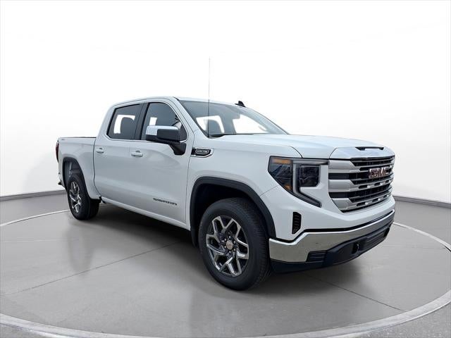 2026 GMC Sierra 1500 SLE in Summit White — front three-quarter view