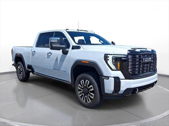 2026 GMC Sierra 2500 HD Denali Ultimate in Glacier White Tricoat — front three-quarter view
