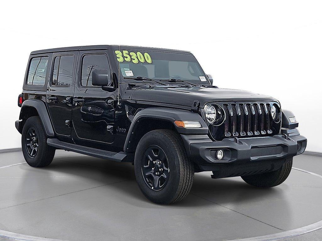 2023 Jeep Wrangler 4-Door Sport 4x4 in Black Clearcoat — front three-quarter view
