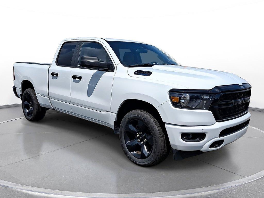 2024 RAM 1500 Tradesman Quad Cab 4x4 6'4' Box in Bright White Clearcoat — front three-quarter view