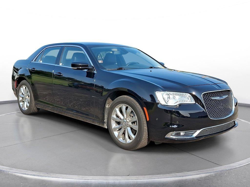 2021 Chrysler 300 Touring L AWD in Gloss Black — front three-quarter view