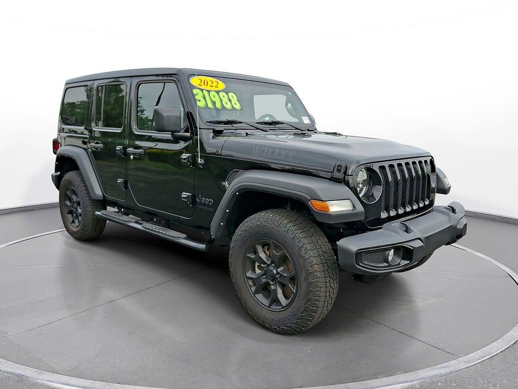 2022 Jeep Wrangler Unlimited Willys 4x4 in Black Clearcoat — front three-quarter view