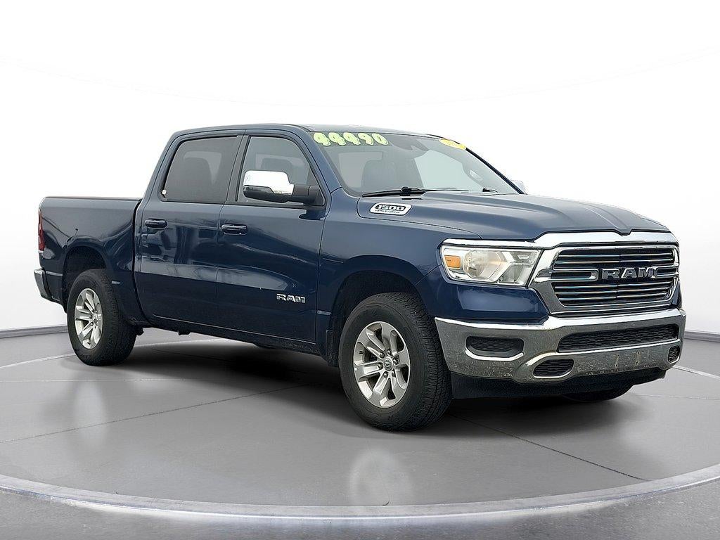 2024 RAM 1500 'Laramie 4x2 Crew Cab 57'' Box' in Patriot Blue Pearlcoat — front three-quarter view