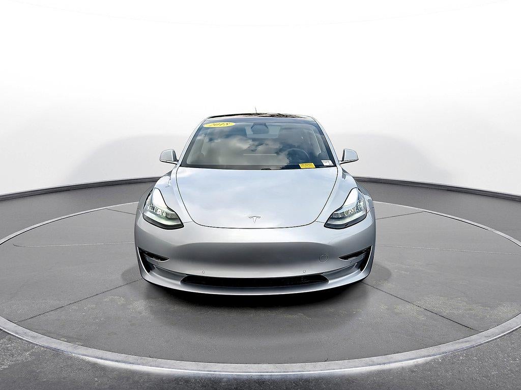 2018 Tesla Model 3 — rear three-quarter view