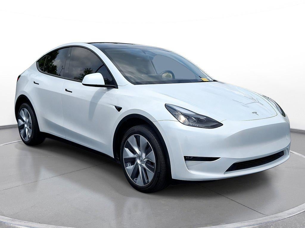 2023 Tesla Model Y Long Range AWD in Pearl White Multi-Coat — front three-quarter view