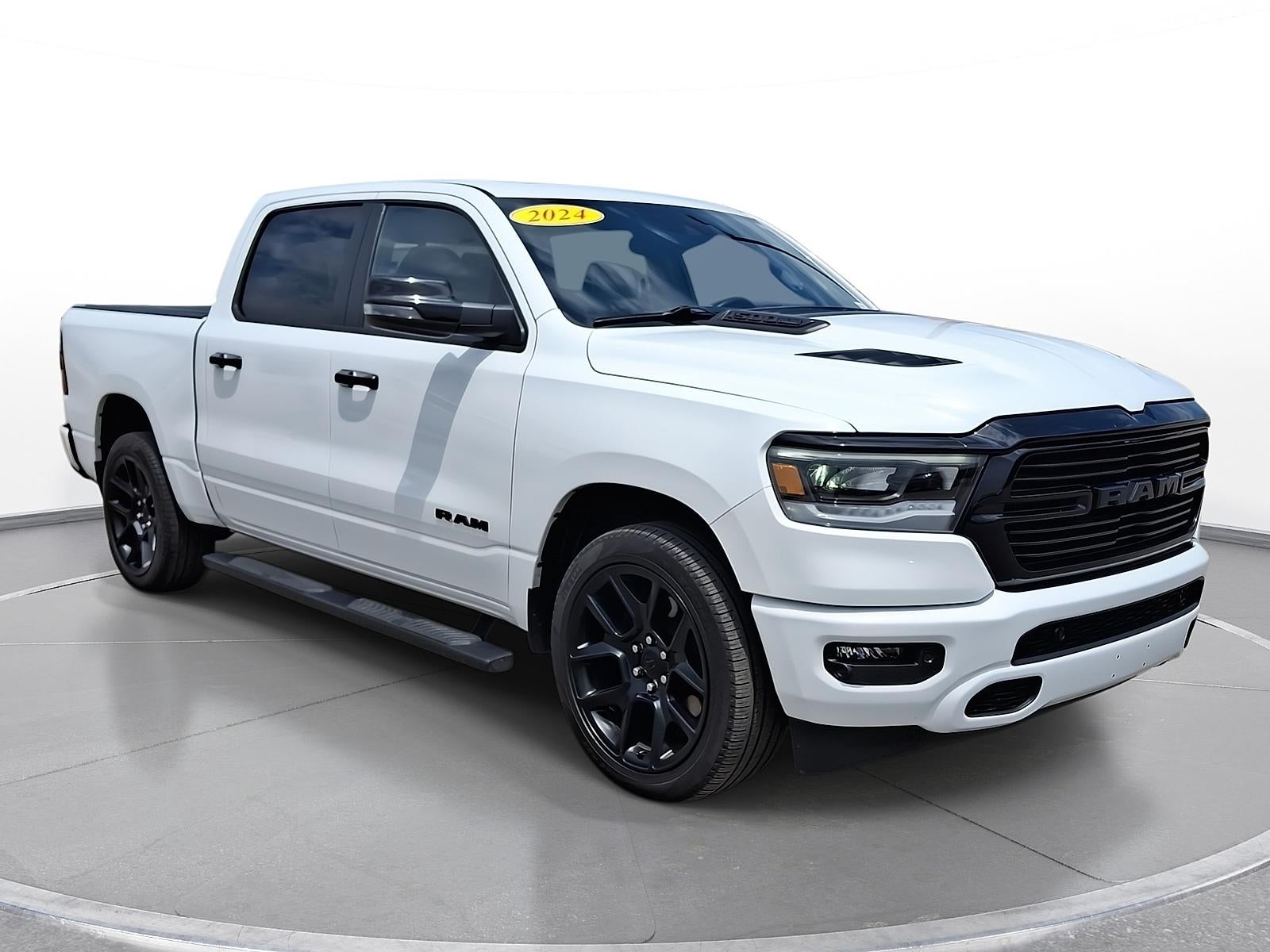 2024 RAM 1500 Laramie in Bright White Clearcoat — front three-quarter view